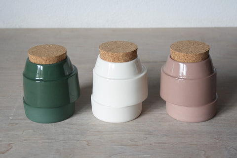 Off-centre Corked Container